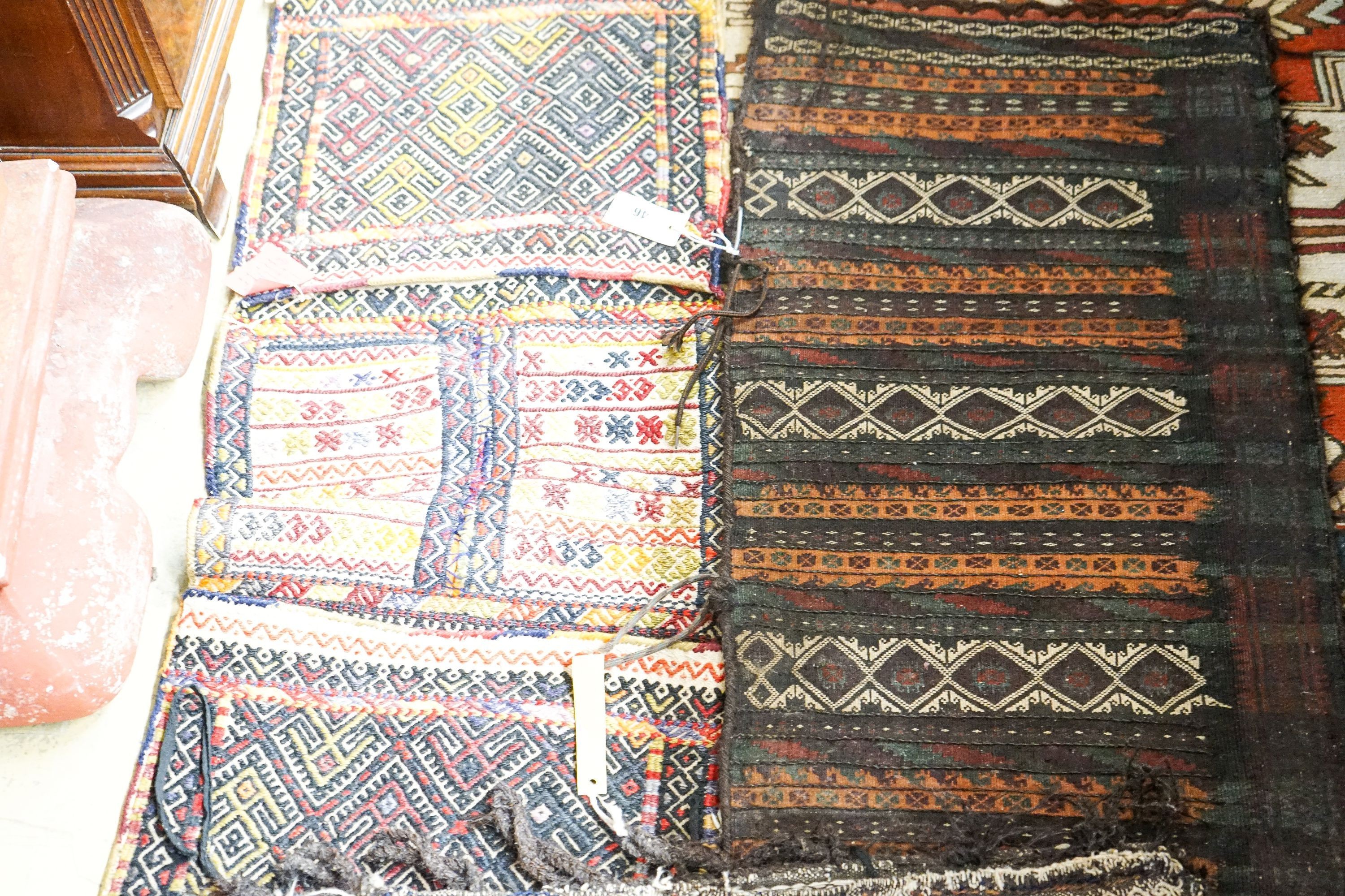Three Belouch / Afghan saddle bags largest 116 x 44 cms.